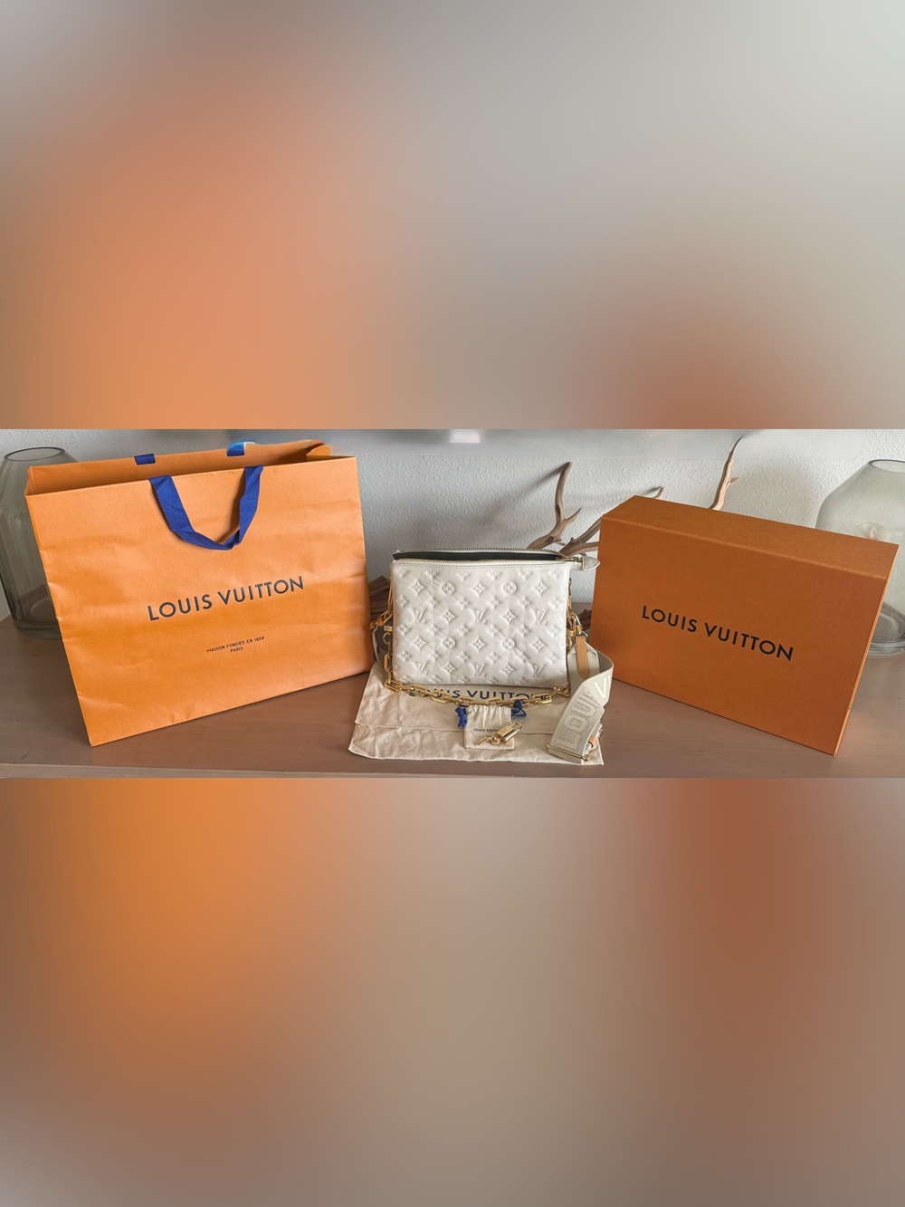 Louis Vuitton Coussin PM Cream Monogram Embossed Crossbody with Chain Strap.